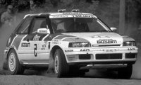 Mazda 323 GTX, No.5, 1000 Lakes Rallye, with night lights, T.Salonen/V.Silander, 1990