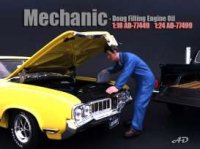 Figurne Mechanic *Doug Filling Engine Oil