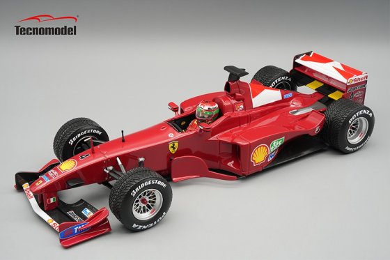FERRARI - F1 F399 SCUDERIA FERRARI N 4 FRENCH GP WITH RAIN TIRES (with pilot figure) 1999 EDDIE IRVINE